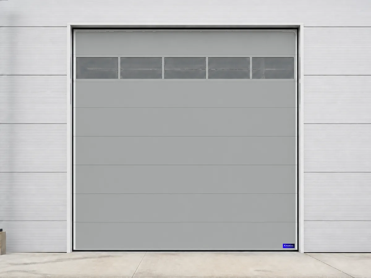 Porte sectionnelle vitrée pour un atelier de l’Est lyonnais